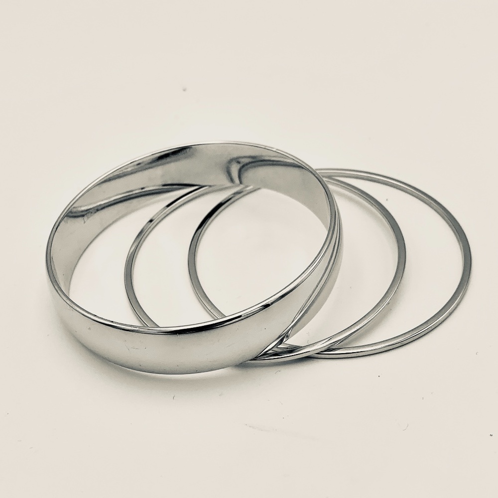 Monet Silver Plated Bangle Bracelets - image 1